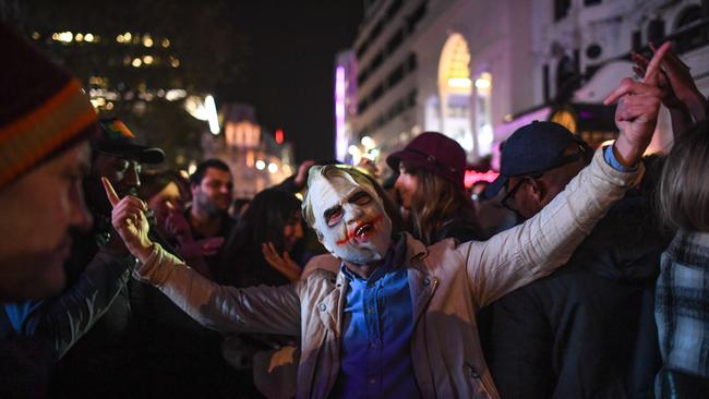 A man wearing fancy dress is seen taking part in a dance off in Leicester Square during Halloween celebrations on October 31 in London, England. Picture: Getty