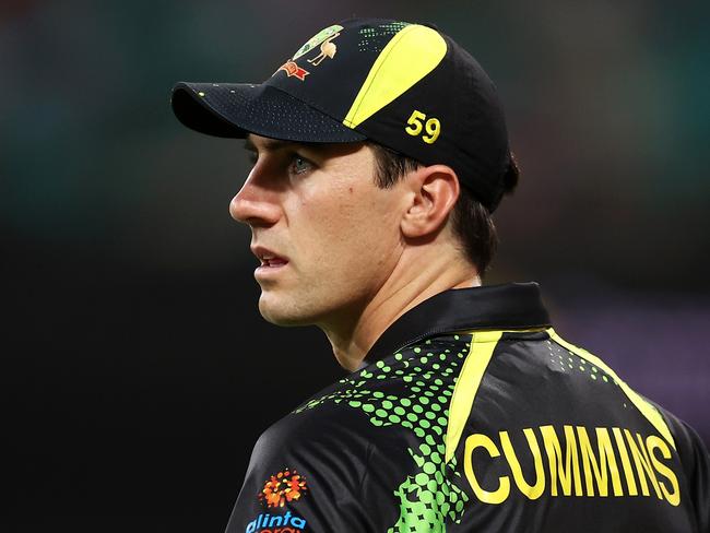 SYDNEY, AUSTRALIA - FEBRUARY 13: Pat Cummins of Australia watches on during game two in the T20 International series between Australia and Sri Lanka at Sydney Cricket Ground on February 13, 2022 in Sydney, Australia. (Photo by Mark Kolbe/Getty Images)