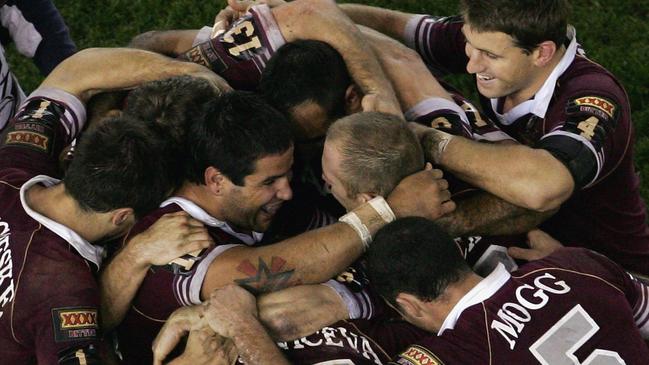 The Maroons celebrate after winning game three of 2006. Picture: Ryan Pierse/Getty Images