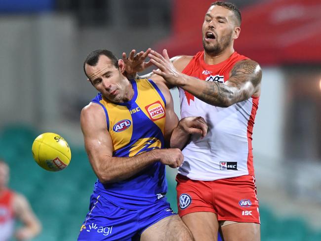 Lance Franklin of the Swans (right) clashes with Shannon Hurn of the Eagles as they chase  the ball during the Round 13 AFL match between the Sydney Swans and the West Coast Eagles at the SCG in Sydney, Friday, June 15, 2018. (AAP Image/David Moir) NO ARCHIVING, EDITORIAL USE ONLY