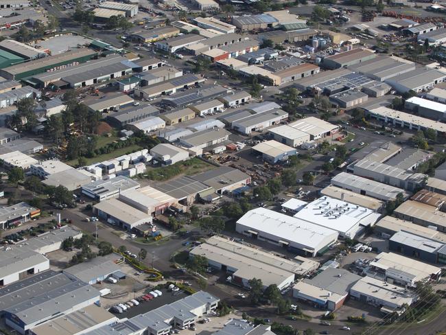 Industrial , small business , factory units and buildings, roof , and streets around Redbank Plains , Brisbane,in generic aerials taken from a light aircraft.