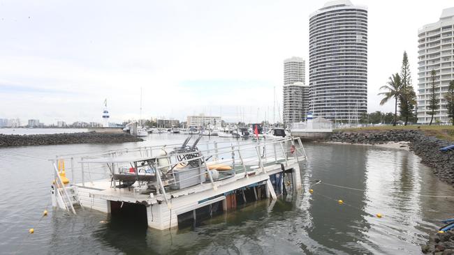 The entrance to the Bayveiw Harbour Yacht Squadron with a sunken houseboat. Picture Mike Batterham