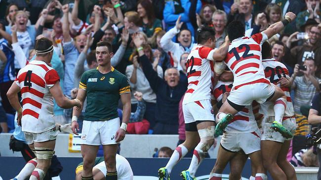 Japan celebrate the match-winning try against South Africa at the 2015 World Cup. Picture: Getty