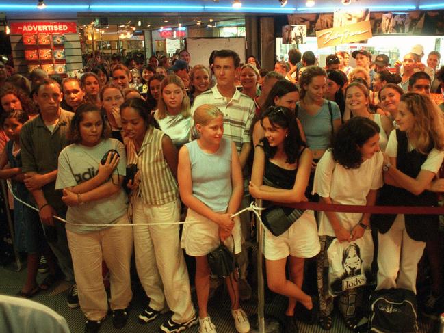 Crowds flock to a Brashs to see the Fugees in 1996.