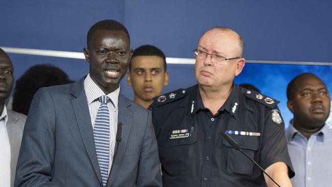 South Sudanese community leader Kot Monoah, left, with Chief Commissioner Graham Ashton.