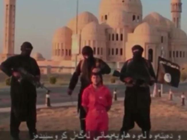 A still from a video showing a Kurdish prisoner moments before he is murdered by his Islamic State captors. Picture: YouTube