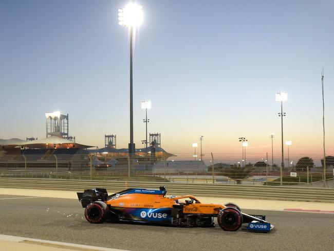 McLaren's Australian driver Daniel Ricciardo drives during the third day of Formula One pre-season testing at the Bahrain International Circuit. (Photo by Mazen MAHDI / AFP)