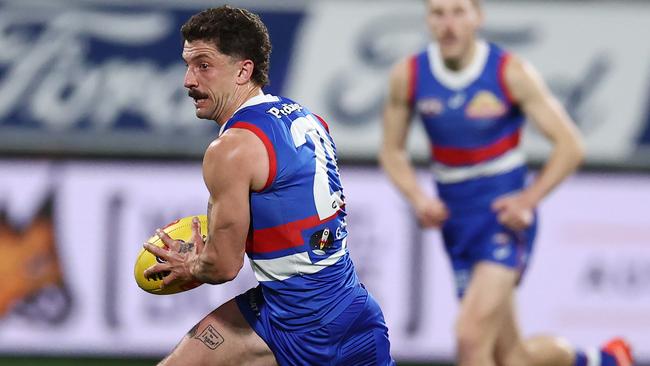 MELBOURNE, AUSTRALIA - August 26 , 2023. AFL .   Bulldog Tom Liberatore during the round 24 match between Geelong and the Western Bulldogs at GMHBA Stadium in Geelong, Australia.  Photo by Michael Klein.