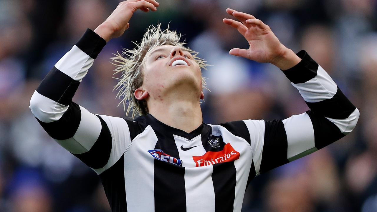 Jack Ginnivan of the Magpies reacts after missing a goal during the 2022 AFL Round 13 match between the Collingwood Magpies and the Melbourne Demons at the Melbourne Cricket Ground on June 13, 2022.