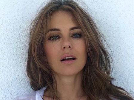 Liz Hurley strips in racy staycation snap