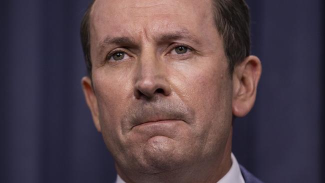 PERTH, AUSTRALIA - FEBRUARY 04: Western Australian Premier Mark McGowan speaks to the media during a press conference at Dumas House on February 4, 2021 in Perth, Australia. Mark McGowan announces a post-lockdown transition period for the Perth and Peel regions. It will remain in place until 12.01am Sunday morning, 14 February Ã¢â¬â allowing for the full 14-day incubation period to run its course. Parts of Western Australia entered a five-day lockdown on February 1, after a hotel quarantine worker tested positive to highly infectious Covid-19 strain. (Matt Jelonek/Getty Images)