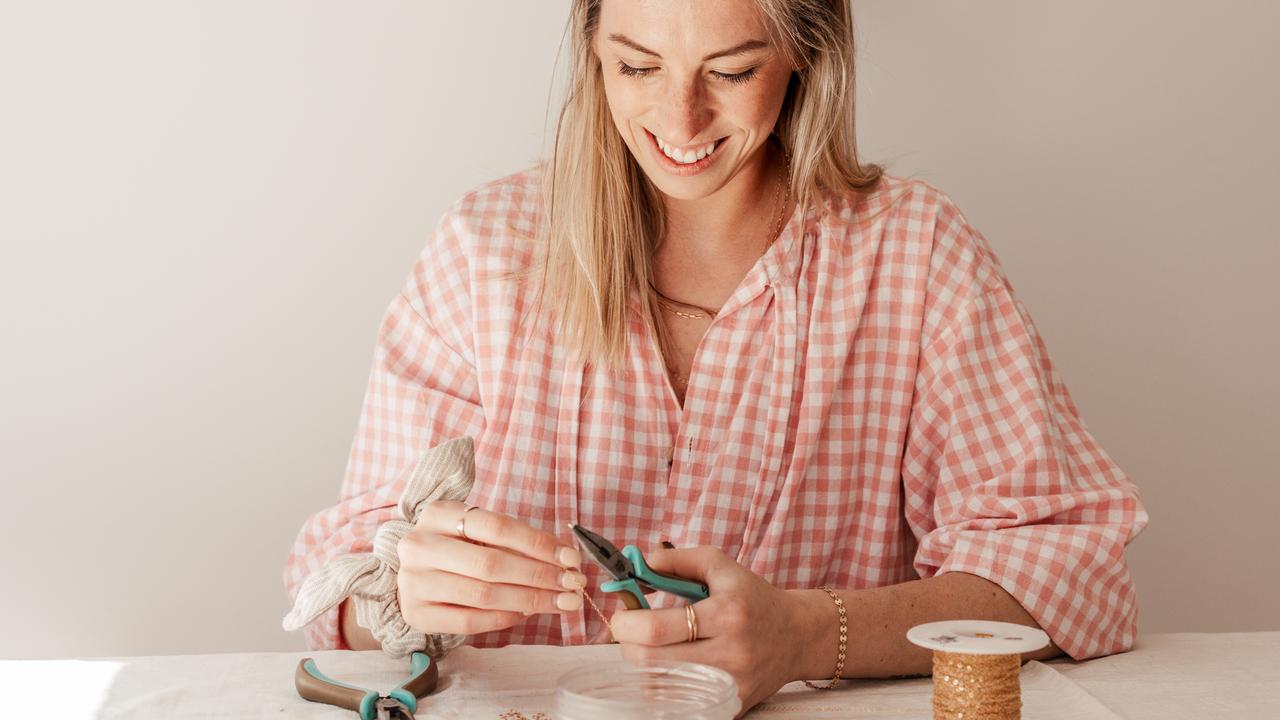 Making a necklace with her newborn son’s name was a catalyst for a booming business for Nikki Kelly. Picture: Supplied