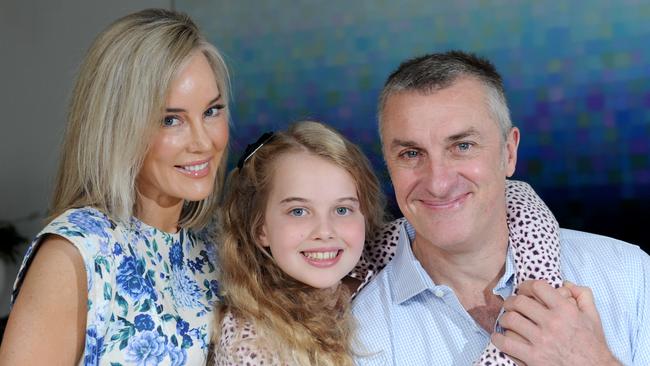 Tom Elliott from 3AW with his wife Elise and daughter Ava. Picture: Andrew Henshaw