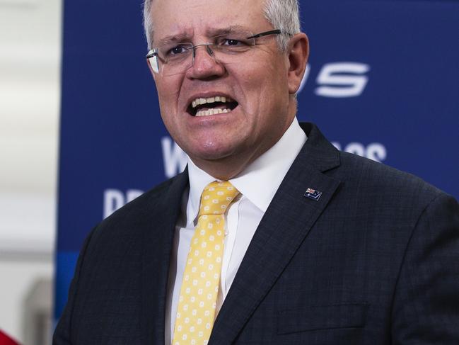 SYDNEY, AUSTRALIA - NewsWire Photos JULY 2: Australian Prime Minister Scott Morrison is pictured as he attends a media opportunity at  defence and space technology company Electro Optic Systems (EOS) in Hume, Canberra. Picture: NCA NewsWire / Terry Cunningham