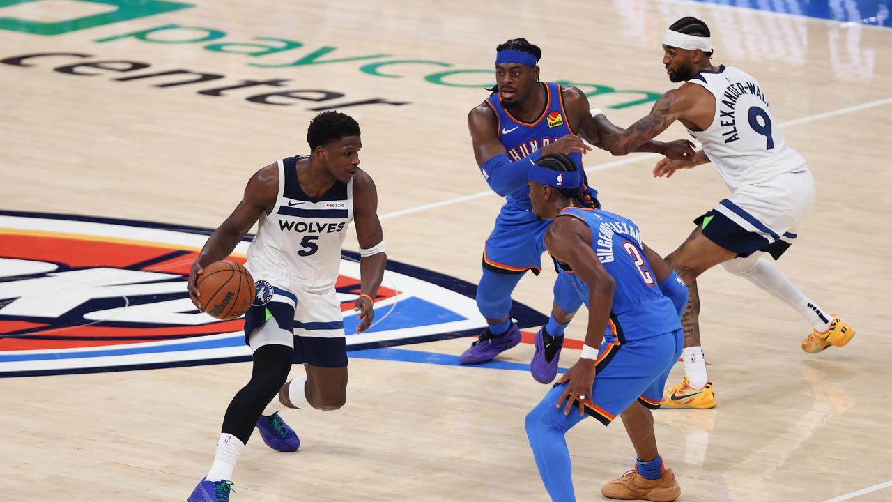 Anthony Edwards (left) and the Timberwolves had no answers. (Photo by Matthew Stockman/Getty Images)