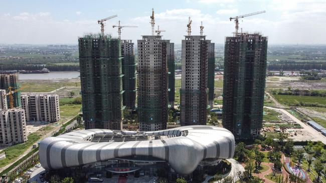 China’s economic problems are a factor in the collapse of the Evergrande building company with construction halted on buildings such as the Evergrande Cultural Tourism City, in Taicang, Suzhou city. Picture: AFP.