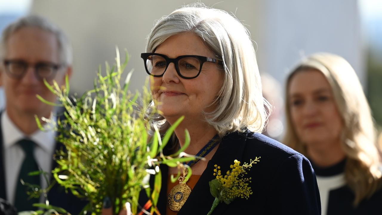 Ms Mostyn was greeted with a smoking ceremony and guard of honour before she was sworn in as governor-general. Picture: NewsWire / Martin Ollman