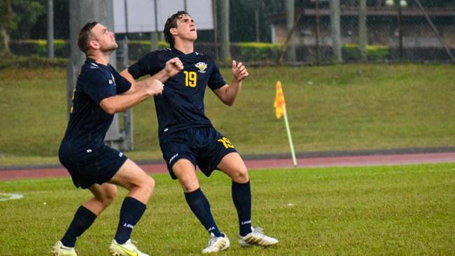 Joshua Chapman on field with Harry Bell in Malaysia 2023.