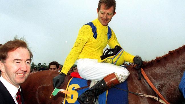 Trainer Dermot Weld with jockey Michael Kinane after Vintage Crop won the 1993 Melbourne Cup.