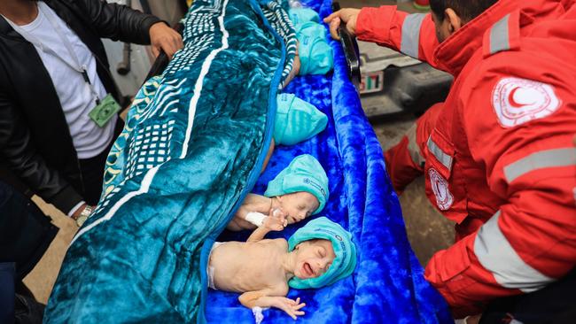 Palestinian medics prepare premature babies, evacuated from Gaza City's Al Shifa hospital, for transfer from a hospital in Rafah in the southern Gaza Strip to Egypt. Picture: AFP