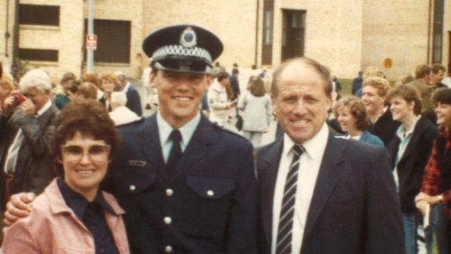 Gary Jubelin with his parents after graduating from the police Academy.