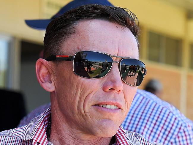 Trainer Chris Munce is seen after jockey Brad Stewart rode Johnny Whitesox to victory in race 2, the Class 1 Handicap, during the Midweek Raceday at the Ipswich Turf Club in Ipswich, Queensland, Wednesday, January 17, 2018. (AAP Image/Albert Perez) NO ARCHIVING, EDITORIAL USE ONLY