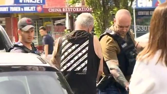 Police raid the Wellbeing Planet. Picture: Seven News