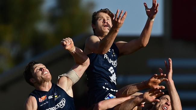 Nathan Kreuger soars over a pack against West Adelaide. Picture: Tom Huntley