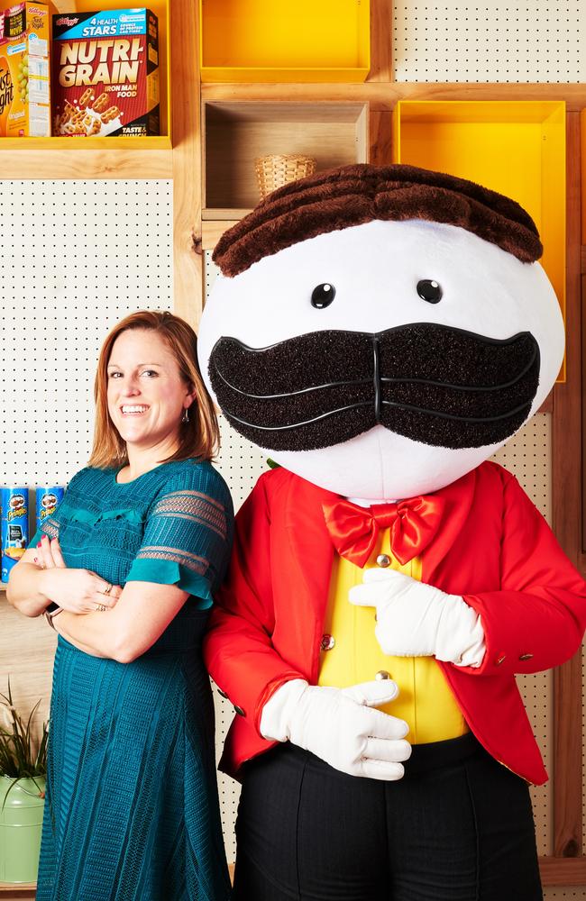 Belinda Tumbers with the character from Pringles chips, owned by Kellogg’s. Picture: Supplied.