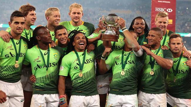 South African rugby team players celebrate winning the final of the Rugby Sevens series in Cape Town. Picture: AFP