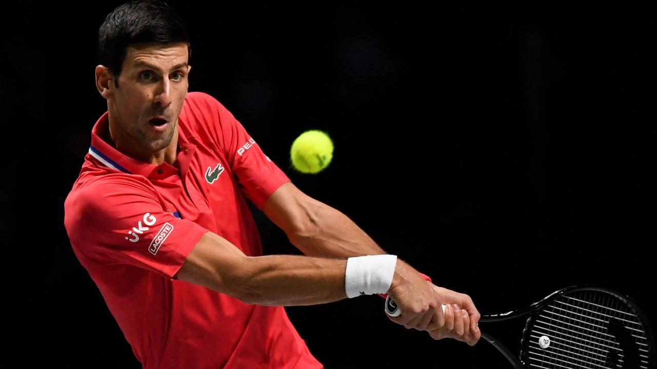 Novak Djokovic could be banned from entering Australia for three years. (Photo by OSCAR DEL POZO / AFP)