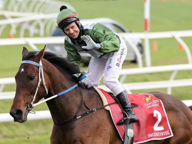 Brett Prebble returns to the mounting yard aboard Incentivise after winning Carlton Draught Caulfield Cup at Caulfield Racecourse on October 16, 2021 in Caulfield, Australia. (George Sal/Racing Photos via Getty Images)