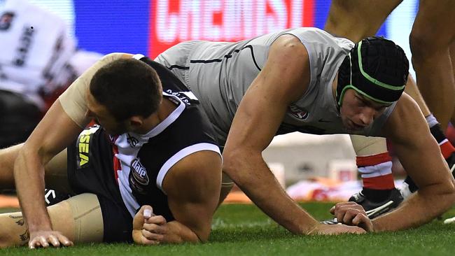 Matthew Kreuzer took a fall and was later ruled out of the match. Picture: AAP