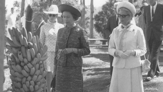 The Queen and Princess Ann looking at a bunch of bananas at Coffs Harbour on April 11, 1970. Picture: John Rotar Collection.