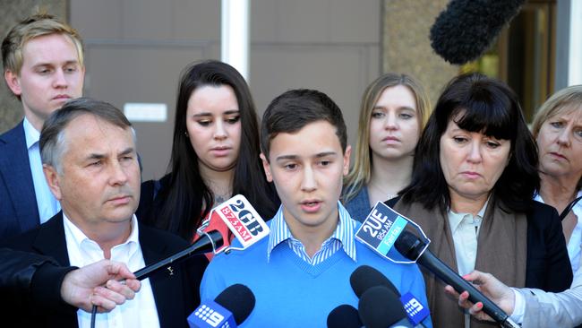 A brother’s love: Family and friends of Thomas Kelly, including his father Ralph (front left) and brother Stuart (centre) and mother Kathy (2nd from right). Picture: AAP Image/Dean Lewins