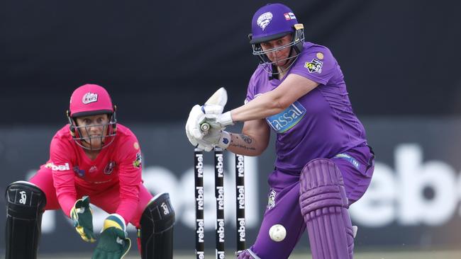 Hurricanes' Rachel Priest smashes down the ground during the WBBL match between the Sydney Sixers and Hobart Hurricanes at the Sydney Showground. Picture: Phil Hillyard