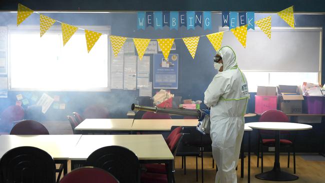 Workers conduct a deep clean at Berala Public School in Sydney. Picture: NCA NewsWire/Joel Carrett