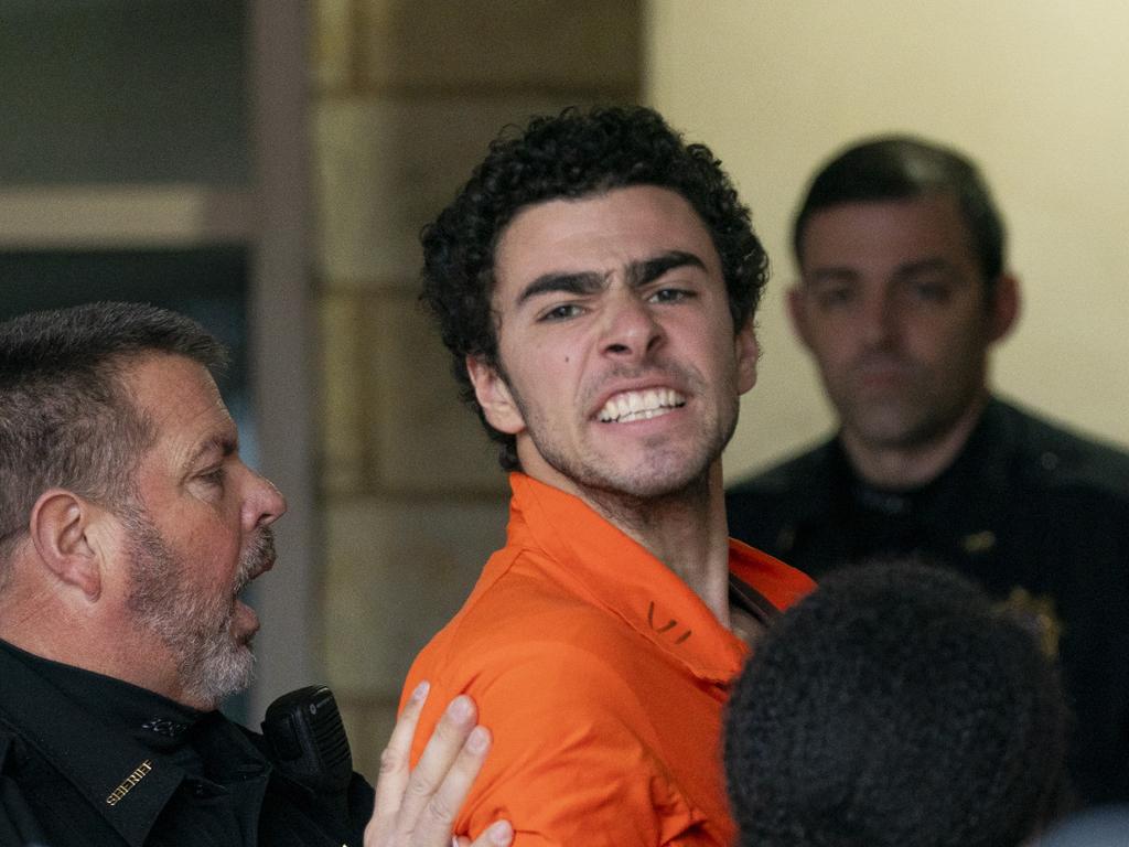 Luigi Mangione is escorted by police to the Blair County Courthouse. Picture: Benjamin B. Braun/Pittsburgh Post-Gazette via AP