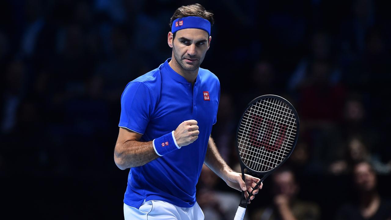 Roger Federer is through to the last four at the ATP Finals. (Photo by Glyn KIRK / AFP)
