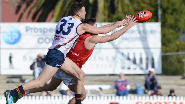 Brodie Smith makes a spoil on North's Aidan Tropiano in the SANFL on Saturday. Picture: AAP Image/ Brenton Edwards