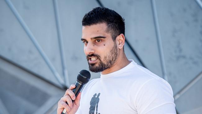 The March for Men rally is met with a Campaign Against Racism and Fascism counter rally at Federation Square. MC Avi Yemini addresses the crowd. Picture: Jake Nowakowski