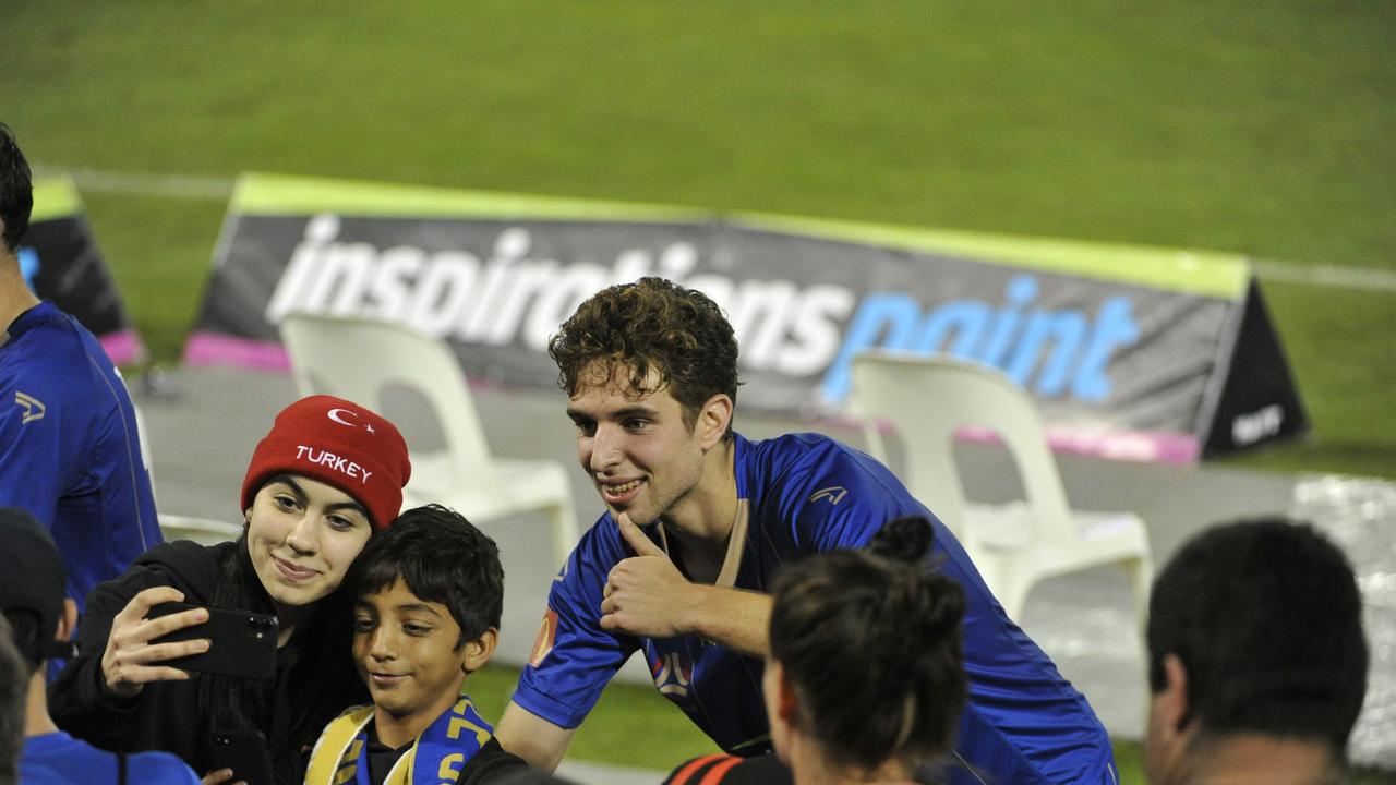 Fans enjoy the atmosphere at the A-League match between Newcastle Jets and Perth Glory at C.ex Stadium, Coffs Harbour. Photo: Tim Jarrett