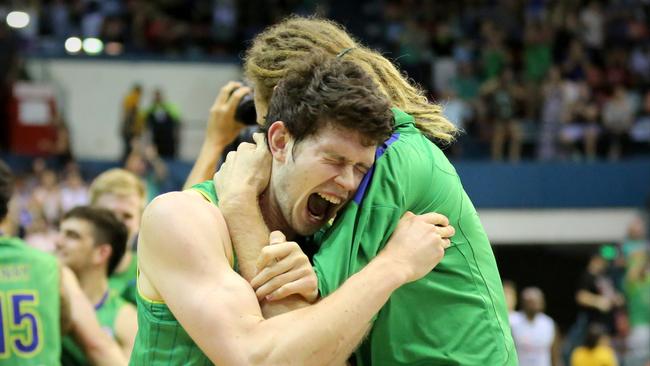 GOOD FEELING: Mackay's Clint Steindl celebrates the Townsville Crocodiles miraculous win against the Adelaide 36ers last week with teammate Luke Schenscher.