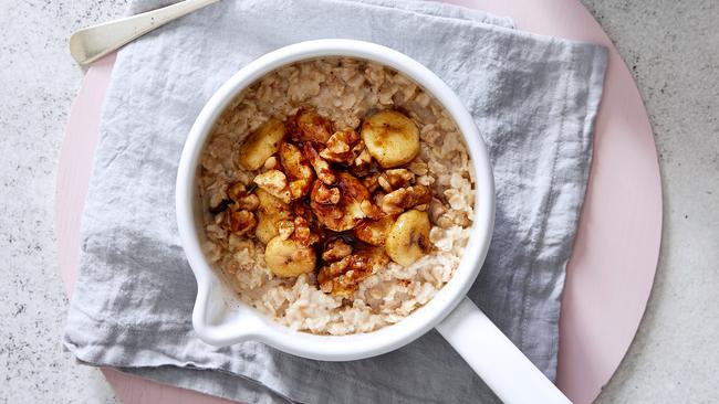 Start the day with oatmeal porridge with caramelised banana and walnuts. Picture: Supplied.