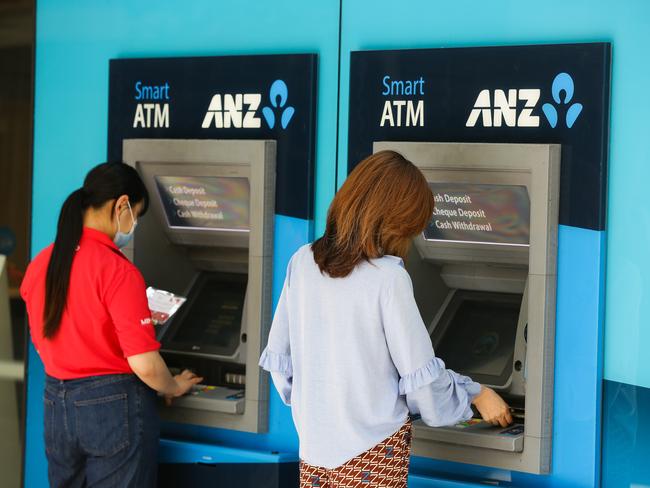 SYDNEY, AUSTRALIA - NewsWire Photos - NOVEMBER 11 2020: A view of young women using an ANZ Bank ATM in the CBD in Sydney Australia. Picture: NCA NewsWire / Gaye Gerard