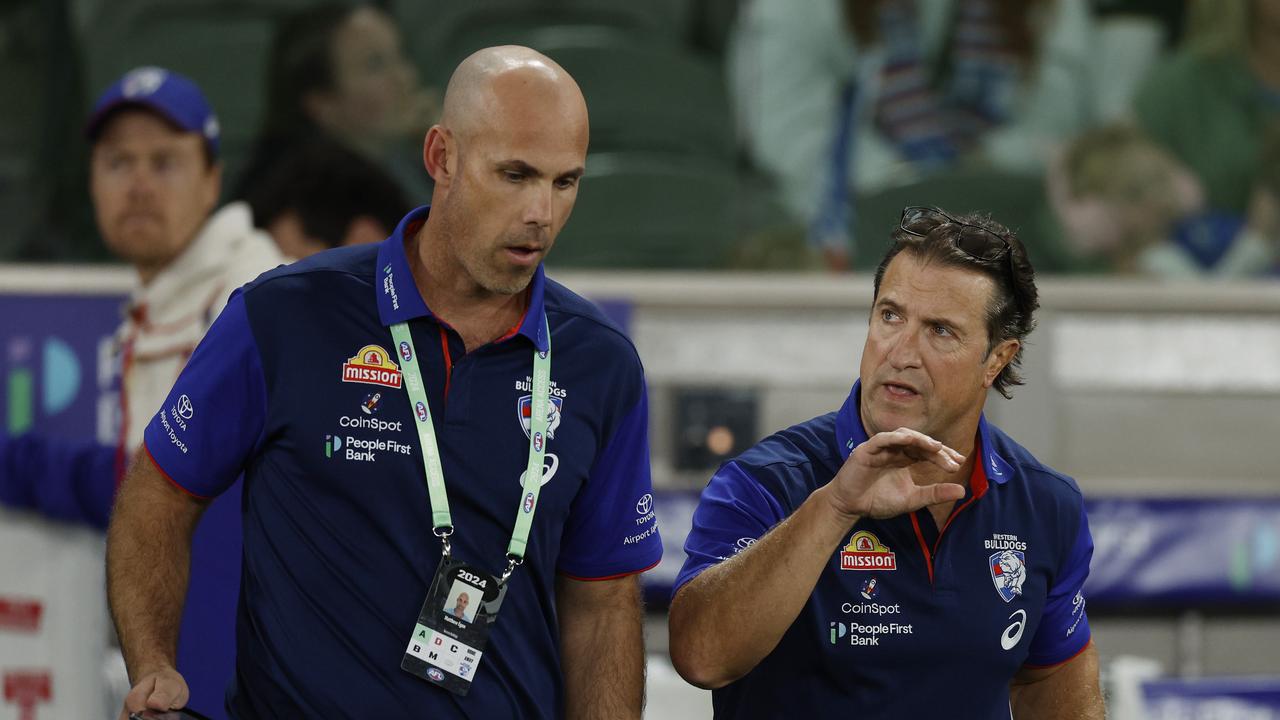 MELBOURNE, AUSTRALIA. May 4, 2024. AFL Round 8. . Western Bulldogs vs. Hawthorn at Marvel Stadium. Luke Beveridge, Senior Coach of the Bulldogs with Matthew Egan at 3 qtr time. Pic: Michael Klein