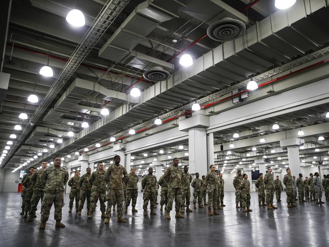 The National Guard stands in formation at the Jacob Javits Center in New York. Picture: AP