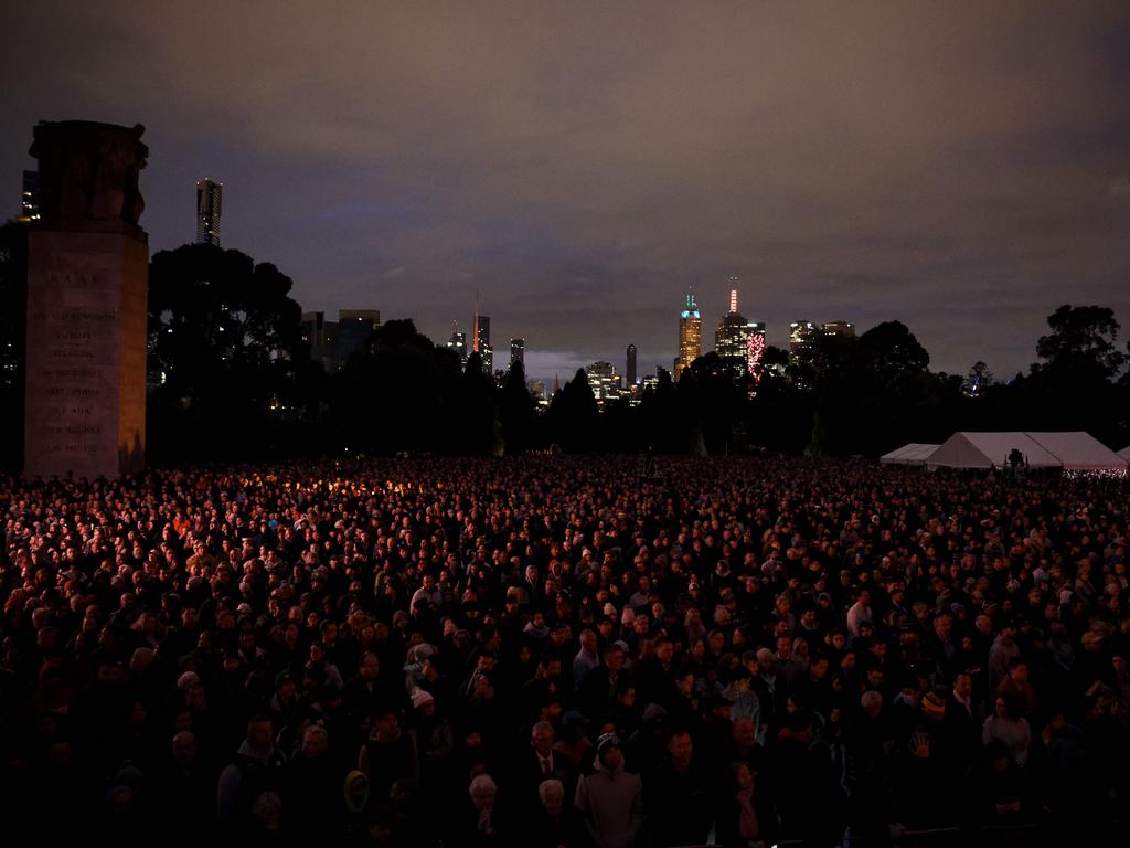 People pay their respects at the Shrine of Remembrance. Picture: Martin Keep/AFP