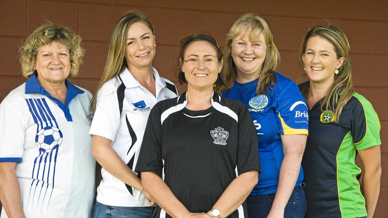 FOOTBALL EVOLUTION: Toowoomba Football League supporters and players (from left) Sue Bubeck, Shannon Tyrrell, Sharon Hill, Rebecca Willmot and Hana Paul love how much the female game has evolved and developed in recent years. Picture: Nev Madsen