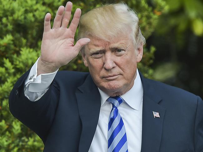 US President Donald Trump waves after he arrived at the White House on May 4, 2018 in Washington, DC. / AFP PHOTO / Andrew CABALLERO-REYNOLDS